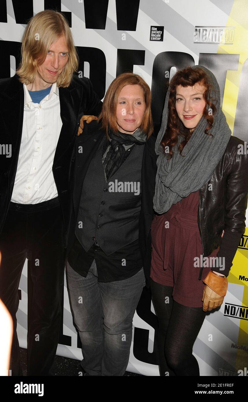 Hole band members L-R: Eric Erlandson, Patty Schemel and Melissa auf der Maur attending the premiere of P. David Ebersole's documentary 'Hit So Hard' held at the Museum of Modern Art in New York City, NY, USA, on March 28, 2011. Photo by Graylock/ABACAPRESS.COM Stock Photo
