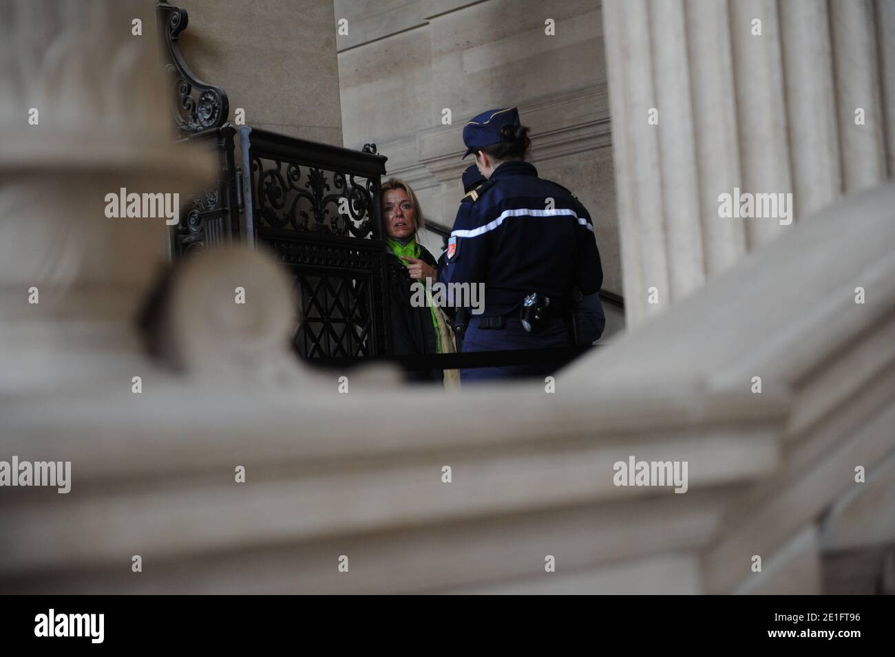 Diana Gunther (L), the daughter of German cardiologist Dieter Krombach at the Palais de Justice where she attended the second day of her father's trial for the murder of Kalinka Bamberski, in Paris, France on March 30, 2011. The French court today decided to continue the trial of the German doctor, who is accused of having raped and killed his then 14-year-old stepdaughter, Kalinka Bamberski, in the summer of 1982 while she was holidaying with her mother at Krombach's home at Lake Constance, southern Germany. A court in Germany ruled that Krombach could not be held responsible for the death, b Stock Photo