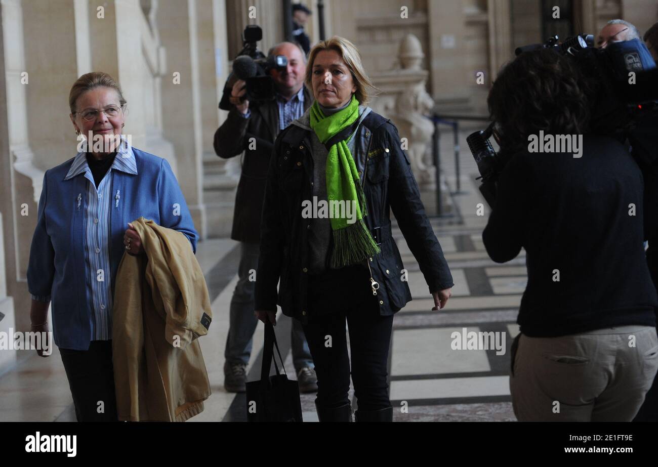 Diana Gunther (R), the daughter of German cardiologist Dieter Krombach, and Krombach's sister (L) at the Palais de Justice where they attended the second day of Krombach's trial for the murder of Kalinka Bamberski, in Paris, France on March 30, 2011. The French court today decided to continue the trial of the German doctor, who is accused of having raped and killed his then 14-year-old stepdaughter, Kalinka Bamberski, in the summer of 1982 while she was holidaying with her mother at Krombach's home at Lake Constance, southern Germany. A court in Germany ruled that Krombach could not be held re Stock Photo