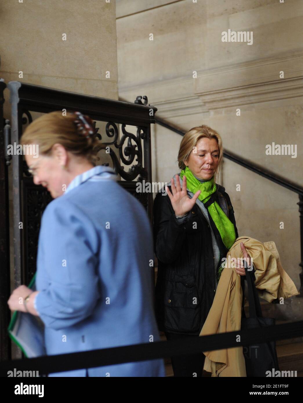 Diana Gunther (R), the daughter of German cardiologist Dieter Krombach, and Krombach's sister (L) at the Palais de Justice where they attended the second day of Krombach's trial for the murder of Kalinka Bamberski, in Paris, France on March 30, 2011. The French court today decided to continue the trial of the German doctor, who is accused of having raped and killed his then 14-year-old stepdaughter, Kalinka Bamberski, in the summer of 1982 while she was holidaying with her mother at Krombach's home at Lake Constance, southern Germany. A court in Germany ruled that Krombach could not be held re Stock Photo