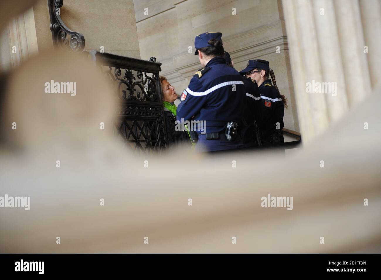 Diana Gunther (L), the daughter of German cardiologist Dieter Krombach at the Palais de Justice where she attended the second day of her father's trial for the murder of Kalinka Bamberski, in Paris, France on March 30, 2011. The French court today decided to continue the trial of the German doctor, who is accused of having raped and killed his then 14-year-old stepdaughter, Kalinka Bamberski, in the summer of 1982 while she was holidaying with her mother at Krombach's home at Lake Constance, southern Germany. A court in Germany ruled that Krombach could not be held responsible for the death, b Stock Photo