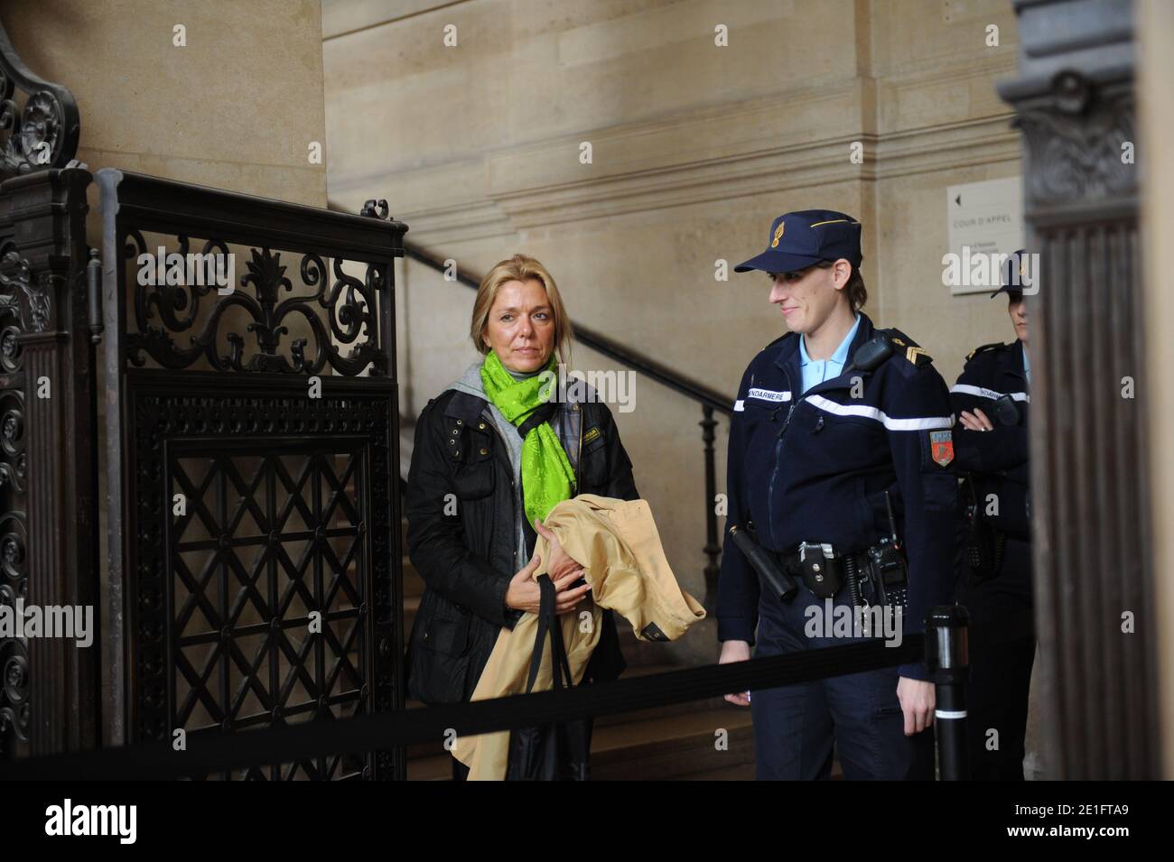 Diana Gunther (L), the daughter of German cardiologist Dieter Krombach at the Palais de Justice where she attended the second day of her father's trial for the murder of Kalinka Bamberski, in Paris, France on March 30, 2011. The French court today decided to continue the trial of the German doctor, who is accused of having raped and killed his then 14-year-old stepdaughter, Kalinka Bamberski, in the summer of 1982 while she was holidaying with her mother at Krombach's home at Lake Constance, southern Germany. A court in Germany ruled that Krombach could not be held responsible for the death, b Stock Photo