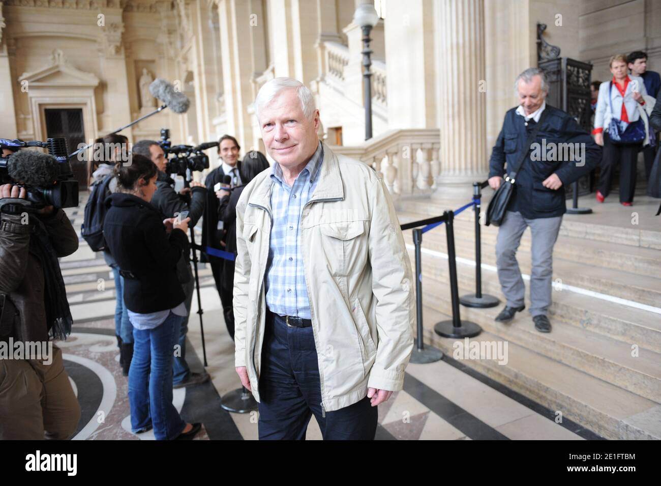Frenchman Andre Bamberski leaving the Palais de Justice where he attended the second day of German cardiologist Dieter Krombach's trial for the murder of Kalinka Bamberski, in Paris, France on March 30, 2011. The French court today decided to continue the trial of the German doctor, who is accused of having raped and killed his then 14-year-old stepdaughter, Kalinka Bamberski, in the summer of 1982 while she was holidaying with her mother at Krombach's home at Lake Constance, southern Germany. A court in Germany ruled that Krombach could not be held responsible for the death, but in 1995 a cou Stock Photo