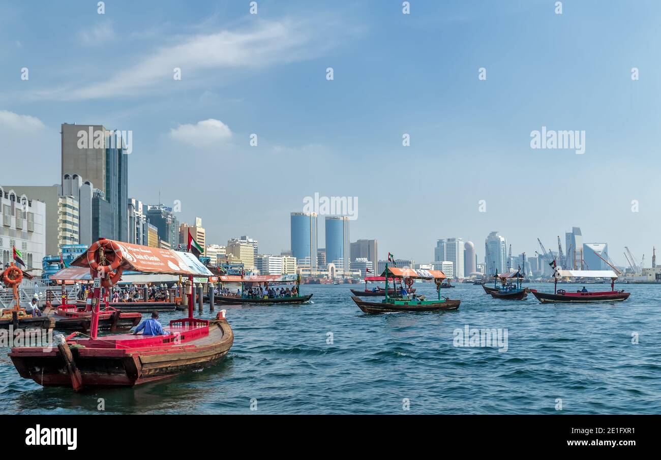 Dubai, UAE - JAN 23, 2016: Dubai Water Canal cruise in a traditional abra. RTA Abra water taxi station in Deira Stock Photo