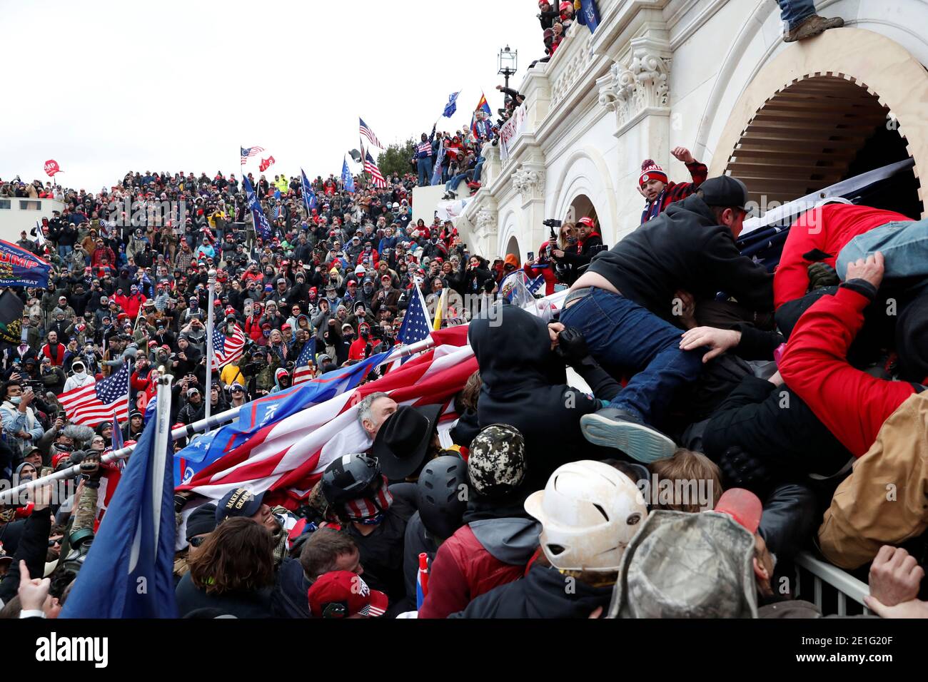 Pro-Trump protesters storm into the U.S. Capitol during clashes with police, during a rally to contest the certification of the 2020 U.S. presidential election results by the U.S. Congress, in Washington, U.S, January 6, 2021. REUTERS/Shannon Stapleton Stock Photo