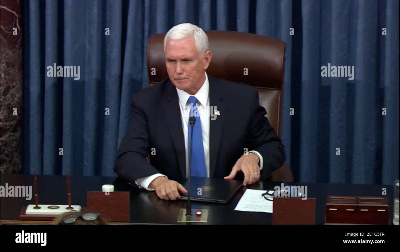 Washington DC, USA. 6th Jan 2021. In this image from United States Senate television, US Vice President Mike Pence makes remarks as the US Senate reconvenes to resume debate on the Electoral Vote count following the violence in the US Capitol in Washington, DC on Wednesday, January 6, 2021.Mandatory Credit: US Senate Television via CNP | usage worldwide Credit: dpa picture alliance/Alamy Live News Stock Photo
