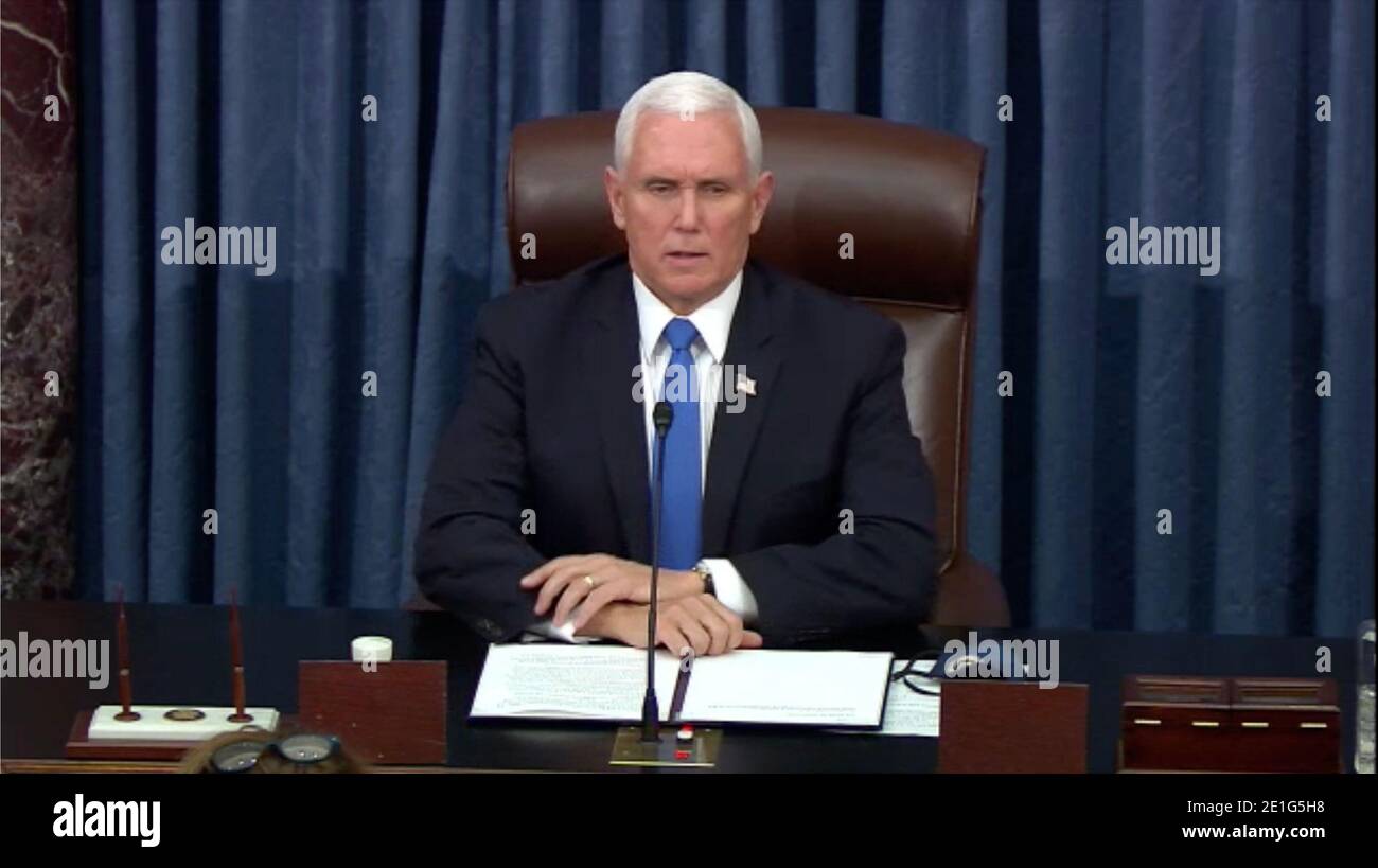Washington DC, USA. 6th Jan 2021. In this image from United States Senate television, US Vice President Mike Pence makes remarks as the US Senate reconvenes to resume debate on the Electoral Vote count following the violence in the US Capitol in Washington, DC on Wednesday, January 6, 2021.Mandatory Credit: US Senate Television via CNP | usage worldwide Credit: dpa picture alliance/Alamy Live News Stock Photo