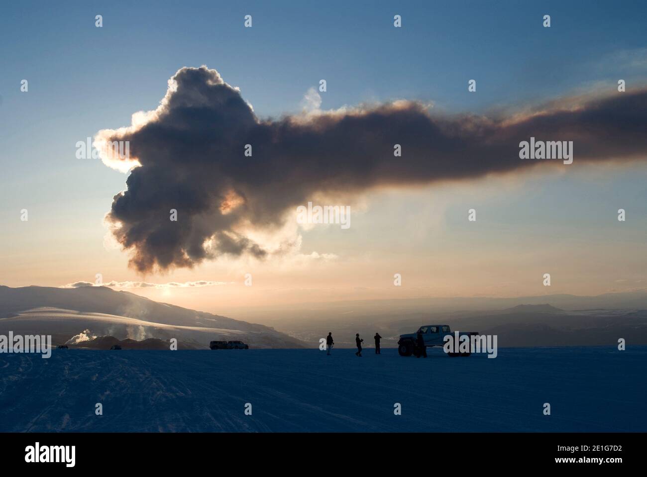 Plume of ash from Eyjafjallajokull volcano silhouetted against sunset, Southern Iceland | NONE | Stock Photo