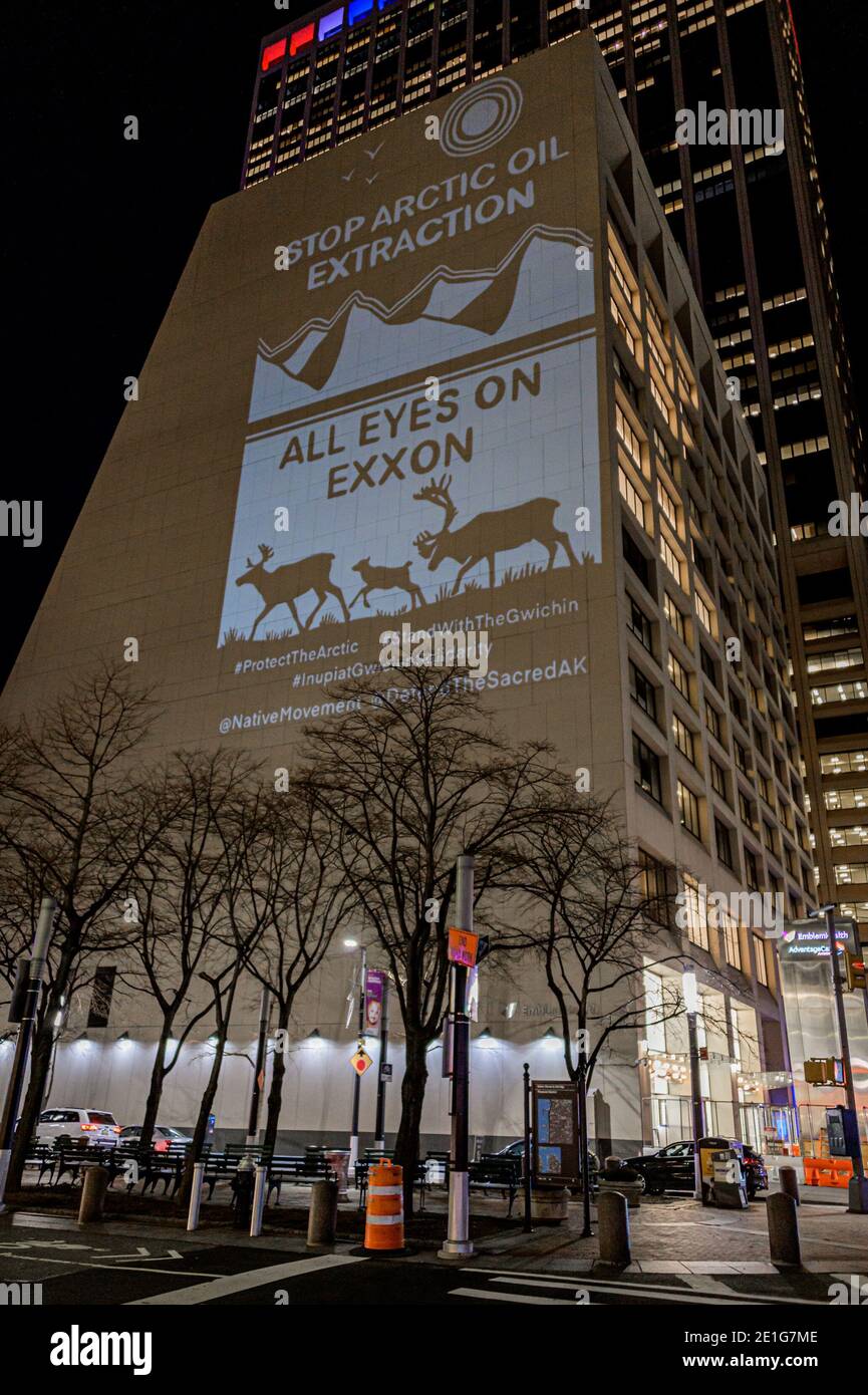 USA. 06th Jan, 2021. Activists with Rainforest Action Network and The Illuminator projected 30ft tall images on the side of a building in the New York financial district on January 6, 2021 with messages opposing the sale of land for oil extraction in the Arctic National Wildlife Refuge. (Photo by Erik McGregor/Sipa USA) Credit: Sipa USA/Alamy Live News Stock Photo