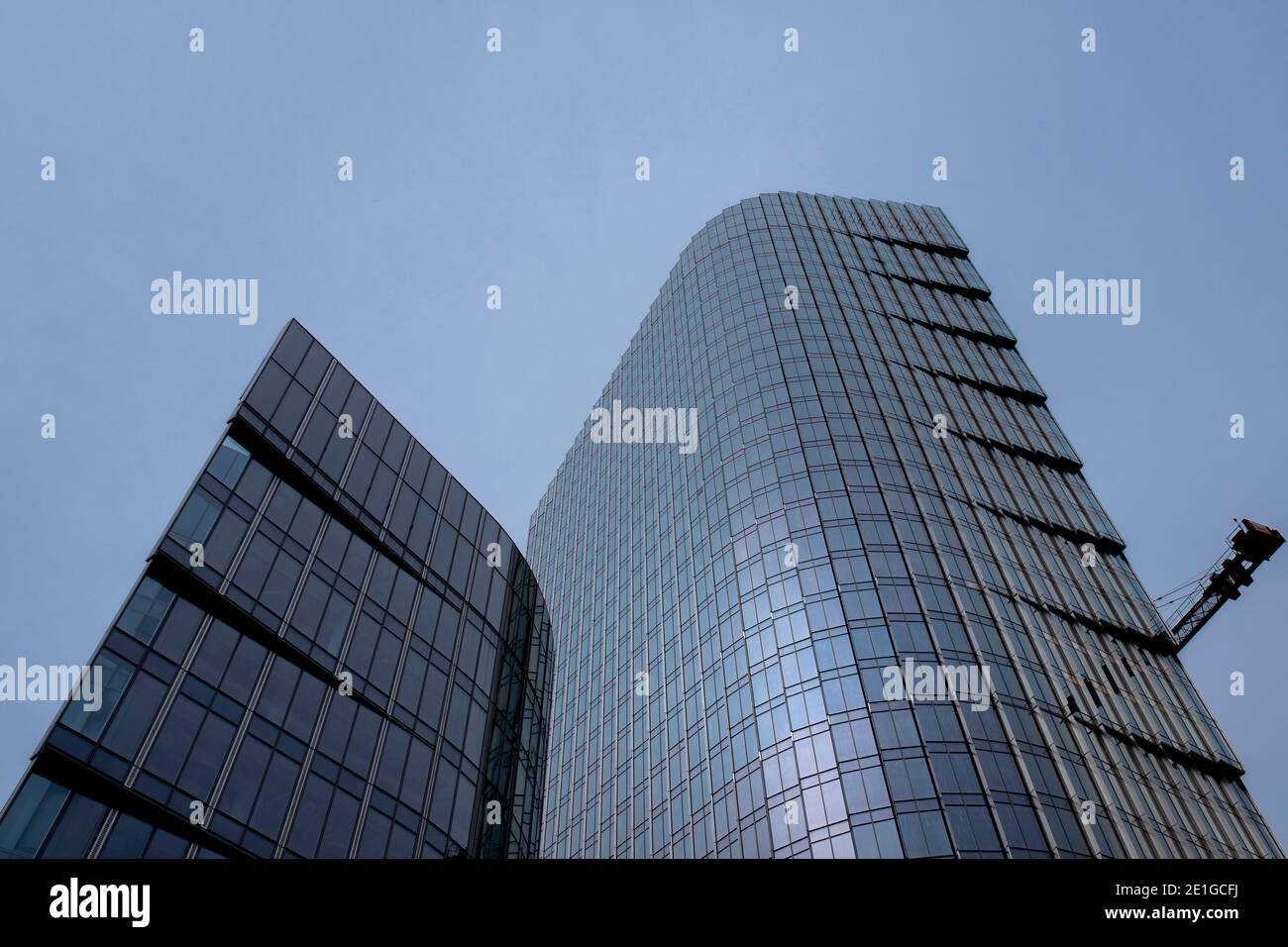 Glass facade of the Mennica Legacy Tower under construction, building completed in 2020, Warsaw, Poland. Stock Photo