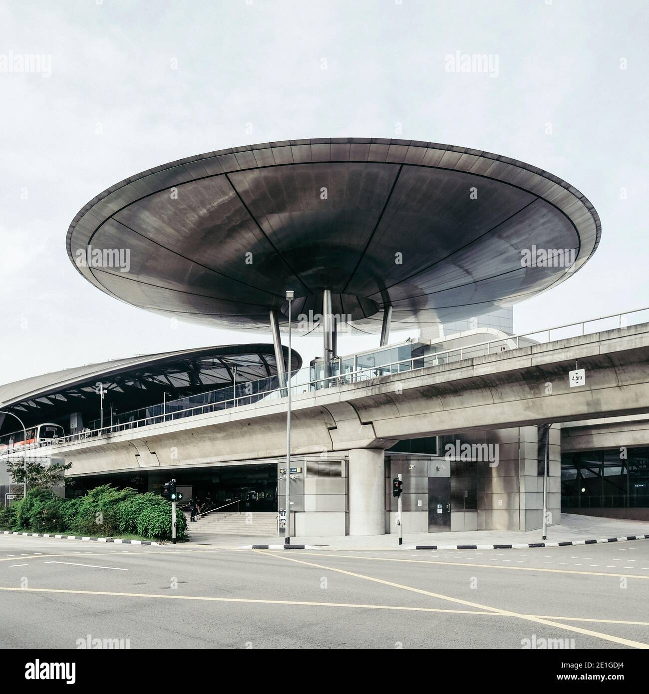 Expo MRT station, Singapore designed by Foster + Partners. A 40-metre-diameter disc, clad in stainless steel, shelters the ticket hall. Stock Photo
