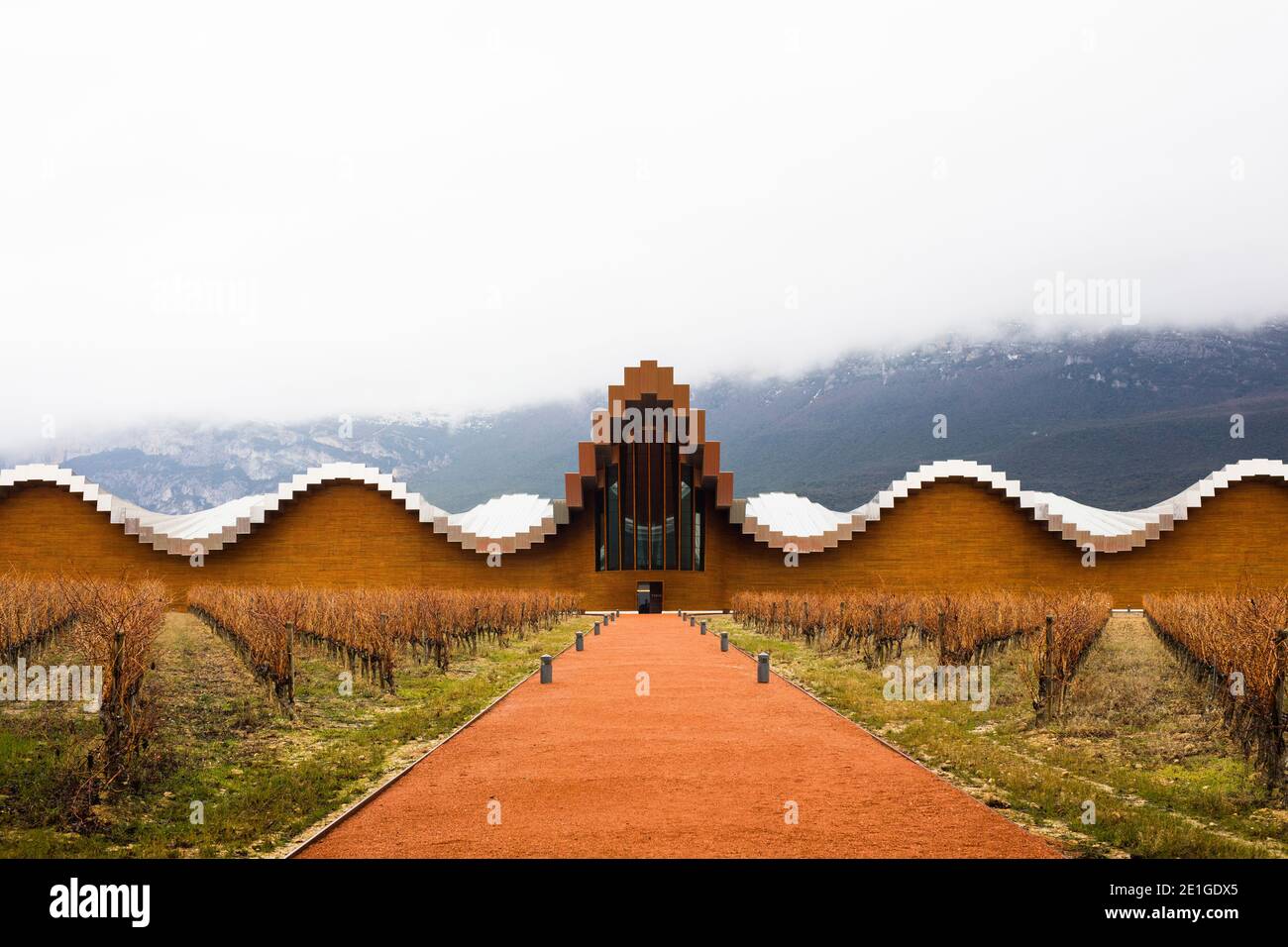 The Bogedgas Ysios Winery, Laguardia is designed by Santiago Calatrava.  It is located in the foothills of Alava, Spain. Stock Photo