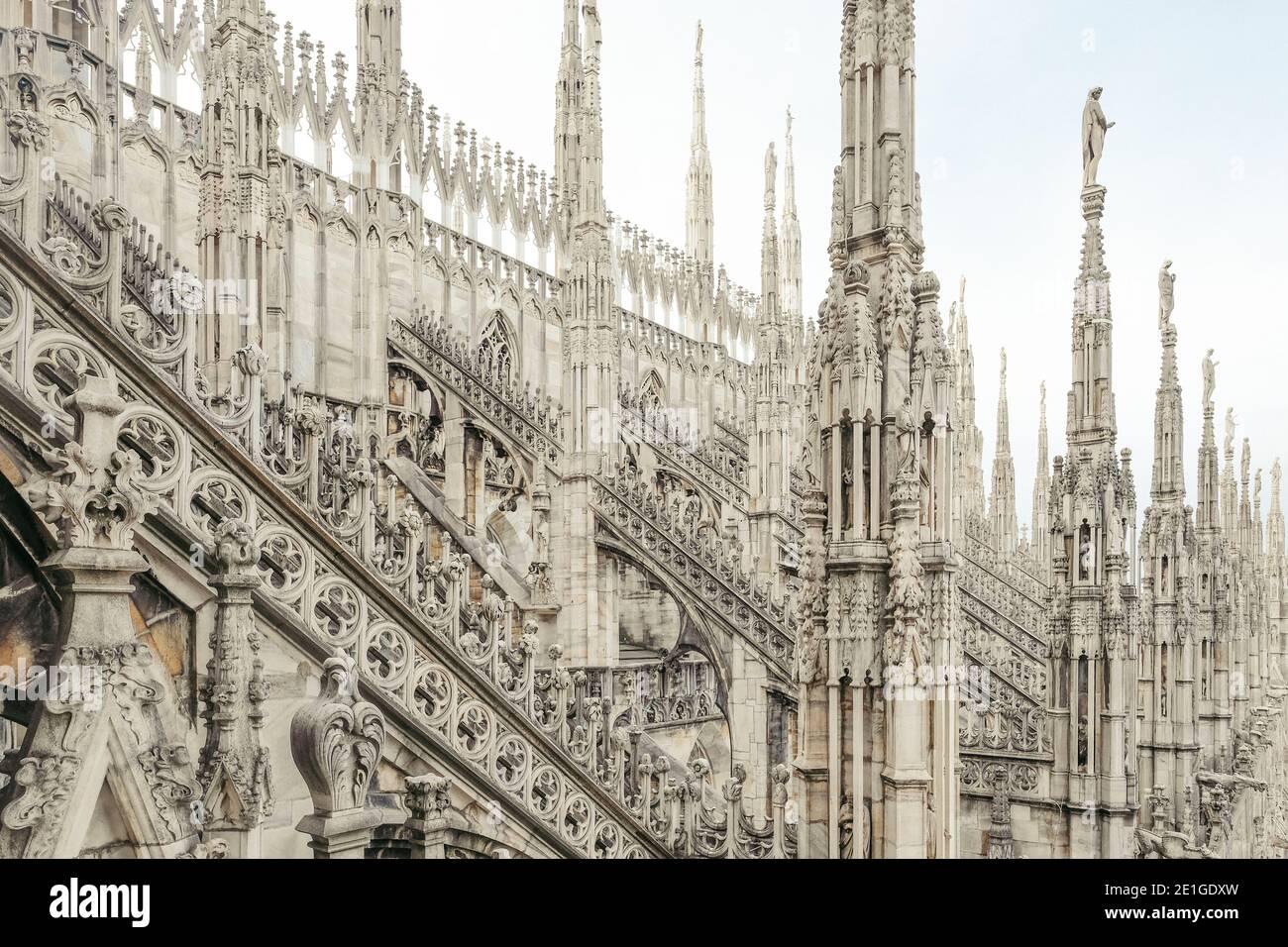 Duomo di Milano is the cathedral church of Milan, Lombardy, Italy. It took nearly six centuries to complete and is the largest church in Italy. Stock Photo