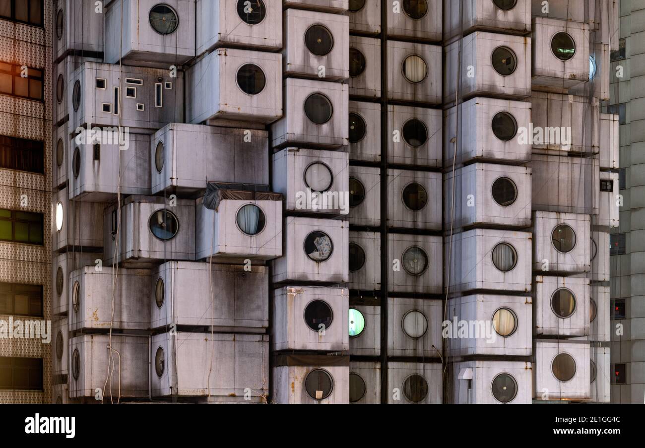 Facade of the Nakagin Capsule Tower, taken from the overpass, Ginza, Tokyo, Japan. Building completed in 1972. Stock Photo