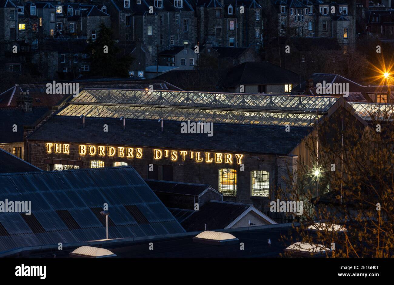 Exterior view of The Borders Distillery, Hawick, Scotland, UK at night. Winner of Architects Journal Retrofit Award 2018 and Civic Trust Award 2019 Stock Photo