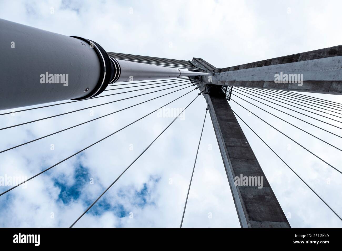 Low angle view of the tower and cables of the Swietokrzyski bridge over the Vistula river in Warsaw, Poland. Stock Photo