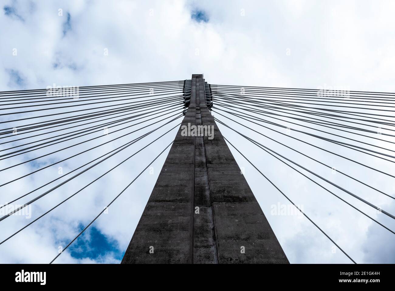 Low angle view of the tower and cables of the Swietokrzyski bridge over the Vistula river in Warsaw, Poland. Stock Photo