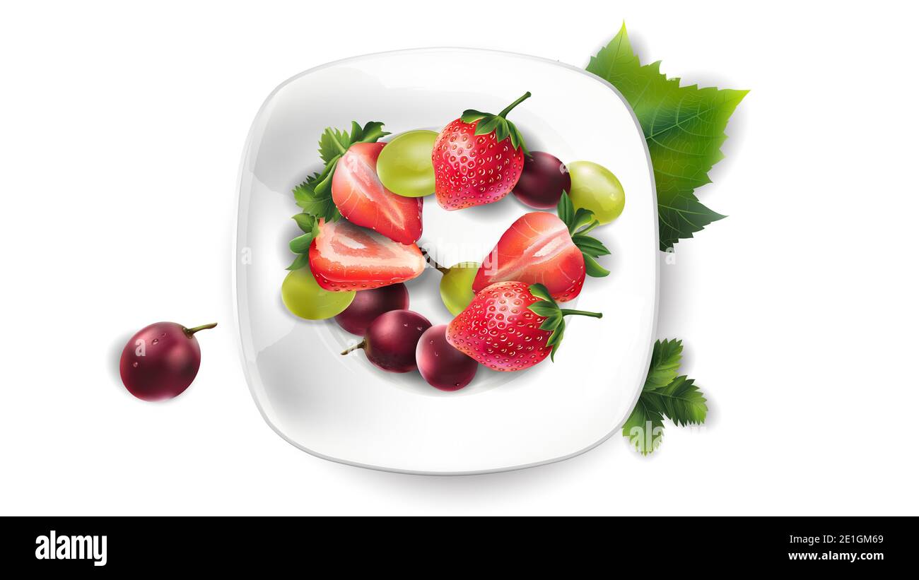 Strawberry and grapes on a white plate. Stock Photo