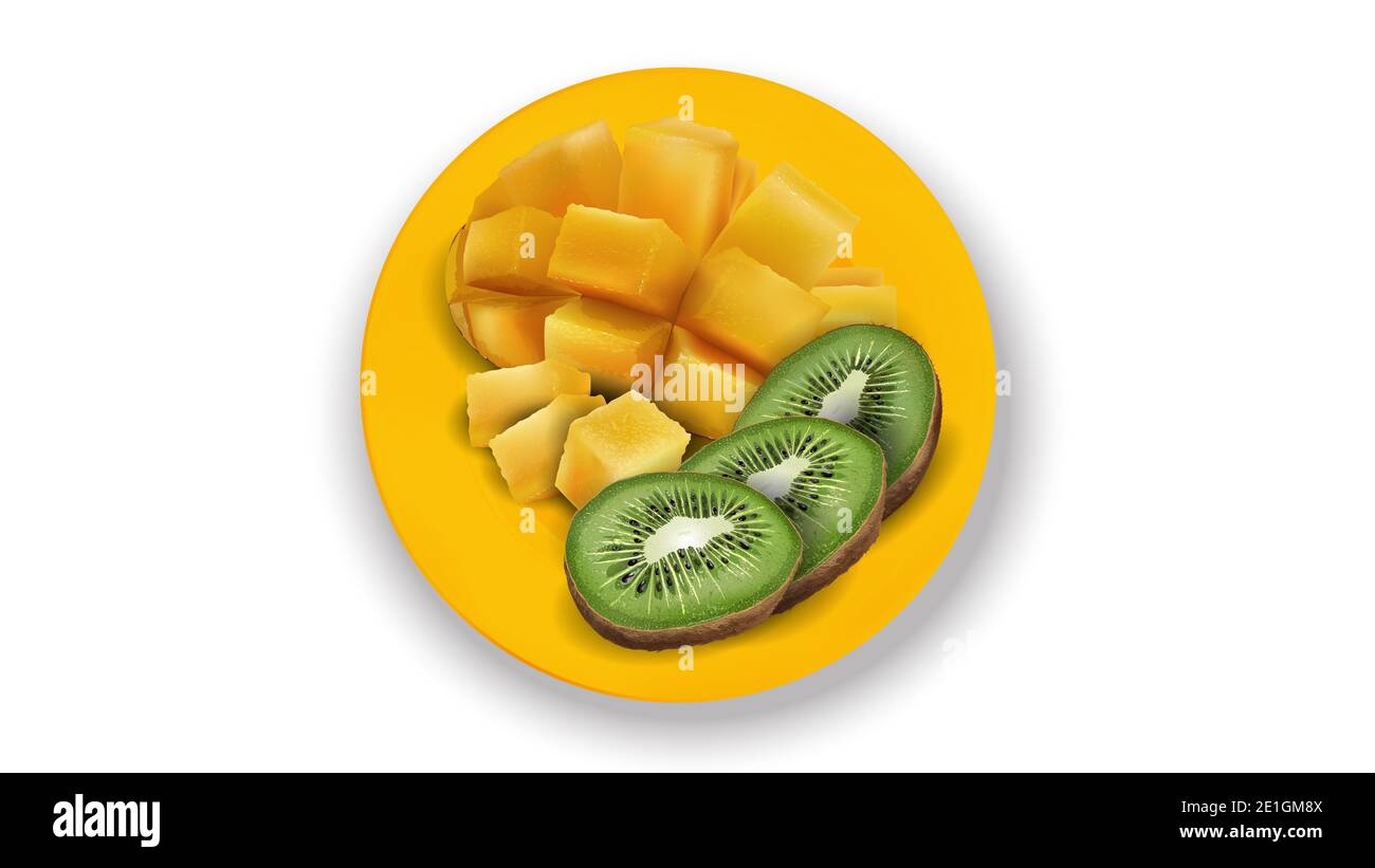 Composition of kiwi slices and diced mango on a yellow plate. Stock Photo
