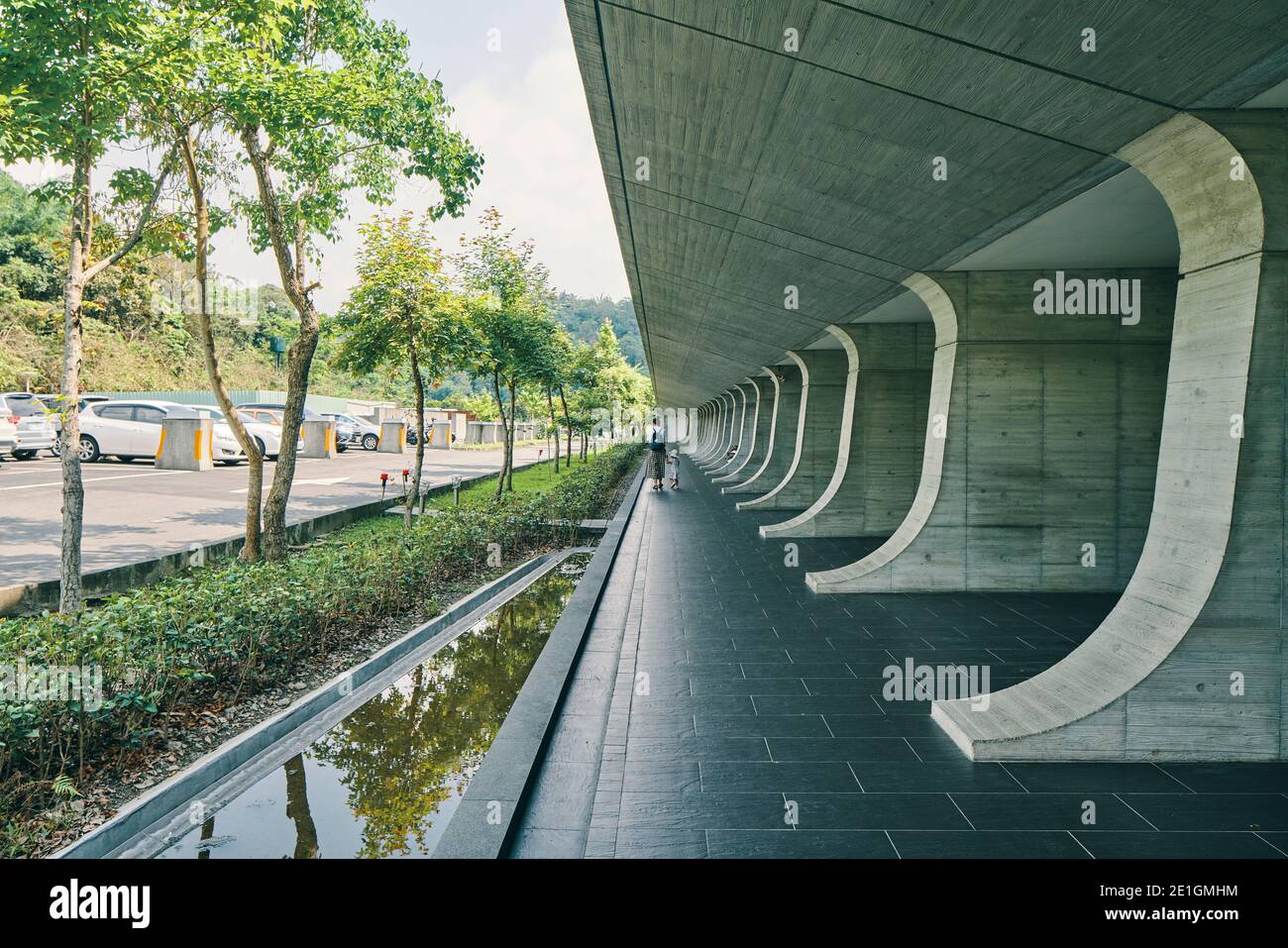 Exterior view of the Xiangshang Visitor Center in Sun Moon Lake, Nantou County, Taiwan, a sleek and harmonious concrete building. Stock Photo