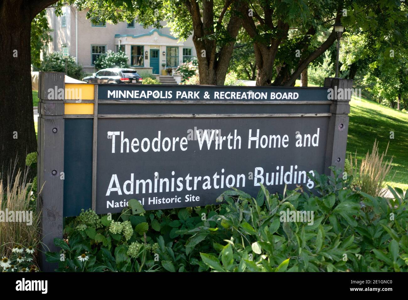 Sign stating that the Theodore Wirth Home is the administration building for the Minneapolis Park Board. Minneapolis Minnesota MN USA Stock Photo