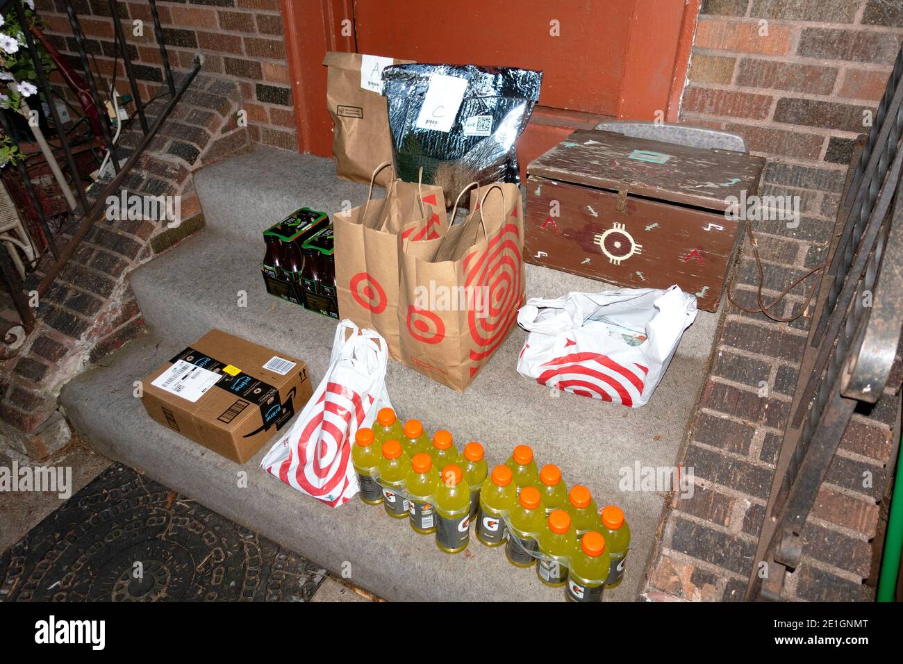 An array of doorstep deliveries from Target, Whole Foods and Amazon during the Covid Pandemic. St Paul Minnesota MN USA Stock Photo
