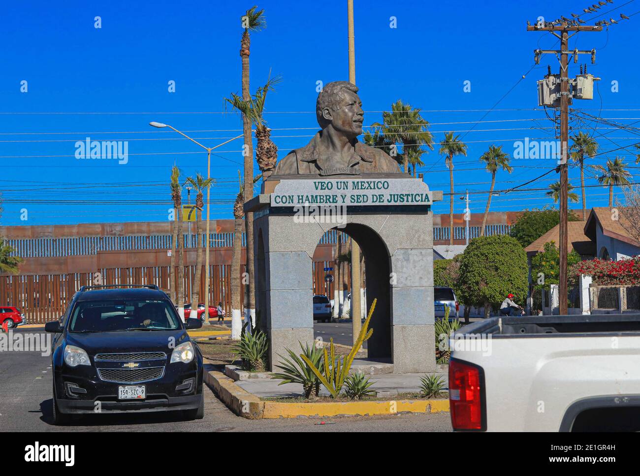 Border wall and bust of Luis Donaldo Colosio in San Luis Río Colorado