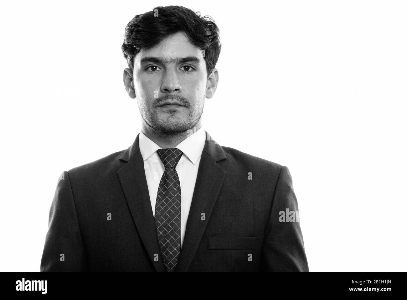 Studio shot of handsome man shot in black and white Stock Photo - Alamy