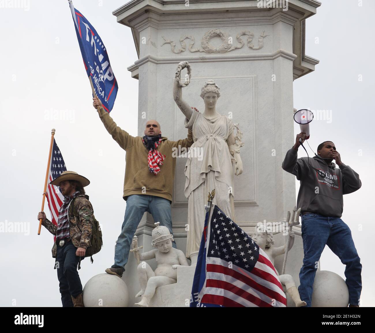 Photos from the January sixth protest at the Capitol building that resulted in 4 deaths. Protestors stormed the innaugural scaffolding and broke into the building despite resistance from officers inside including tear gas. Stock Photo