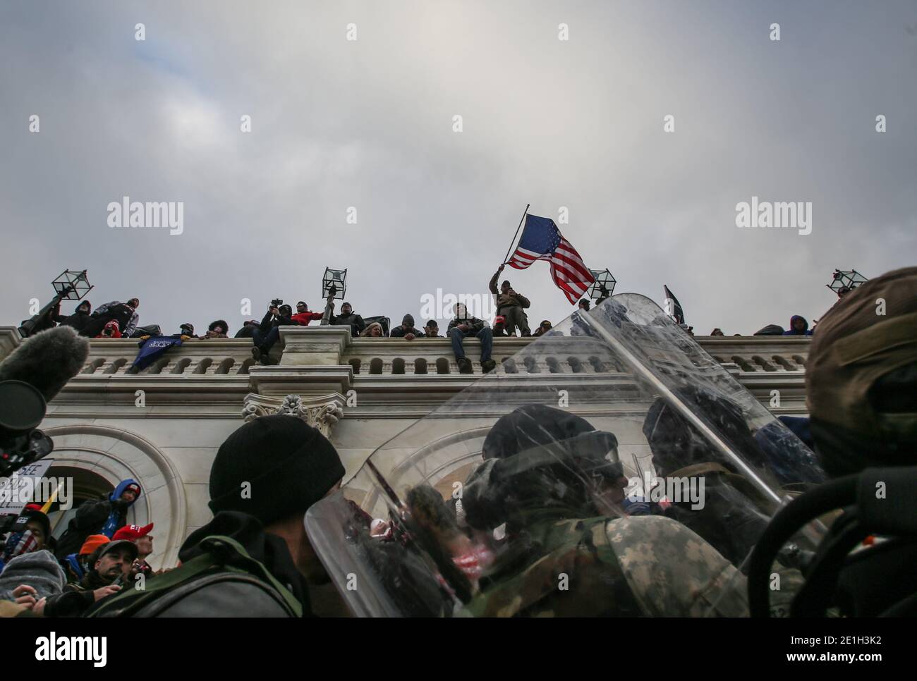 Photos from the January sixth protest at the Capitol building that resulted in 4 deaths. Protestors stormed the innaugural scaffolding and broke into the building despite resistance from officers inside including tear gas. Stock Photo