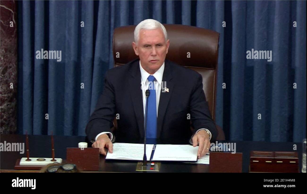 Washington DC, USA. 6th Jan 2021. In this image from United States Senate television, US Vice President Mike Pence makes remarks as the US Senate reconvenes to resume debate on the Electoral Vote count following the violence in the US Capitol in Washington, DC on Wednesday, January 6, 2021. Photo by US Senate Television via CNP/ABACAPRESS.COM Credit: ABACAPRESS/Alamy Live News Stock Photo