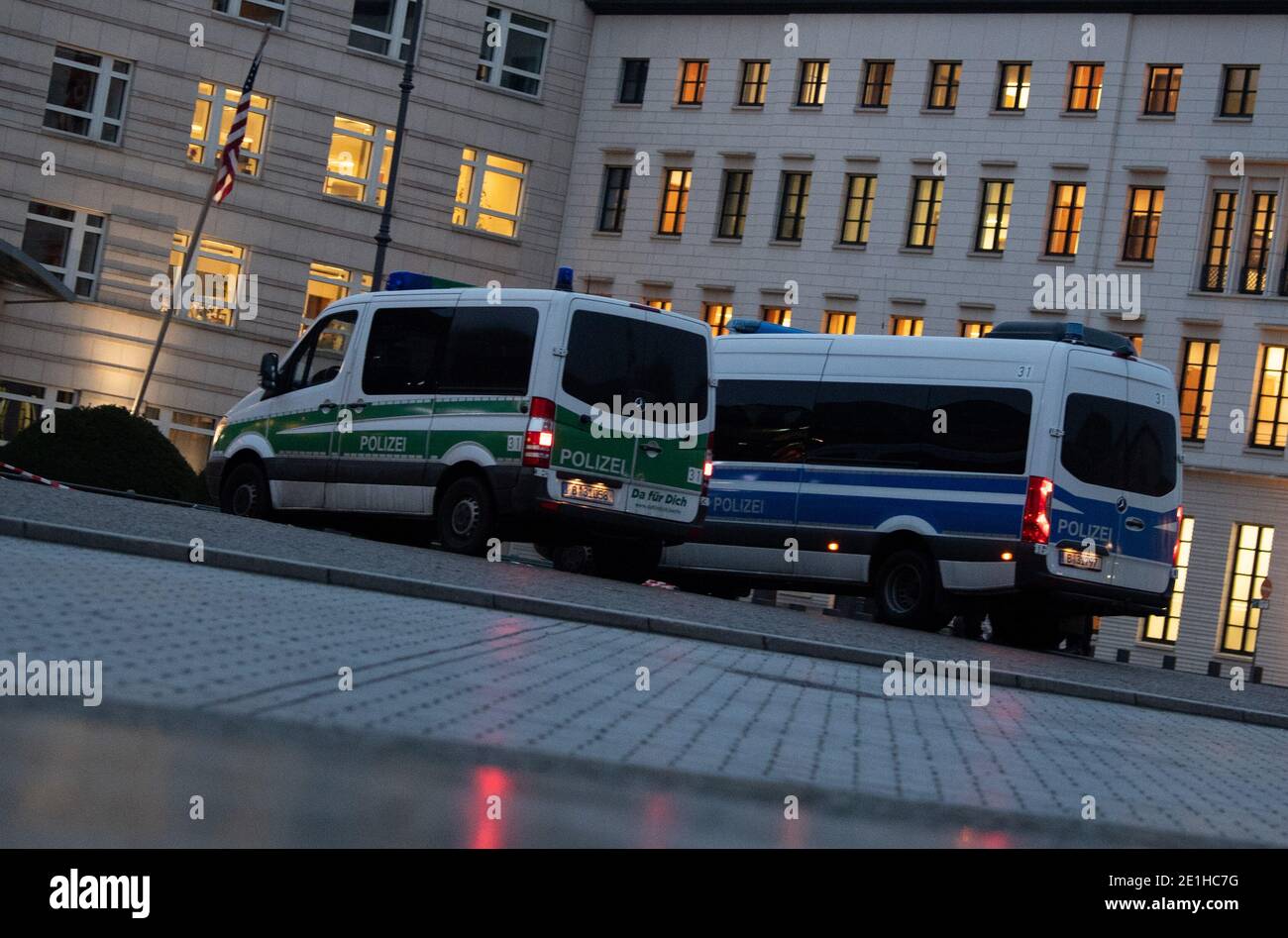 Berlin, Germany. 07th Jan, 2021. Police vehicles stand outside the U.S. Embassy in Germany the morning after the riots at the Capitol. Credit: David Hutzler/dpa/Alamy Live News Stock Photo
