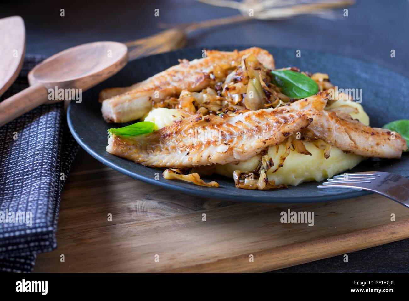 natural pan fried fish with roasted cabbage and mashed potatoes Stock