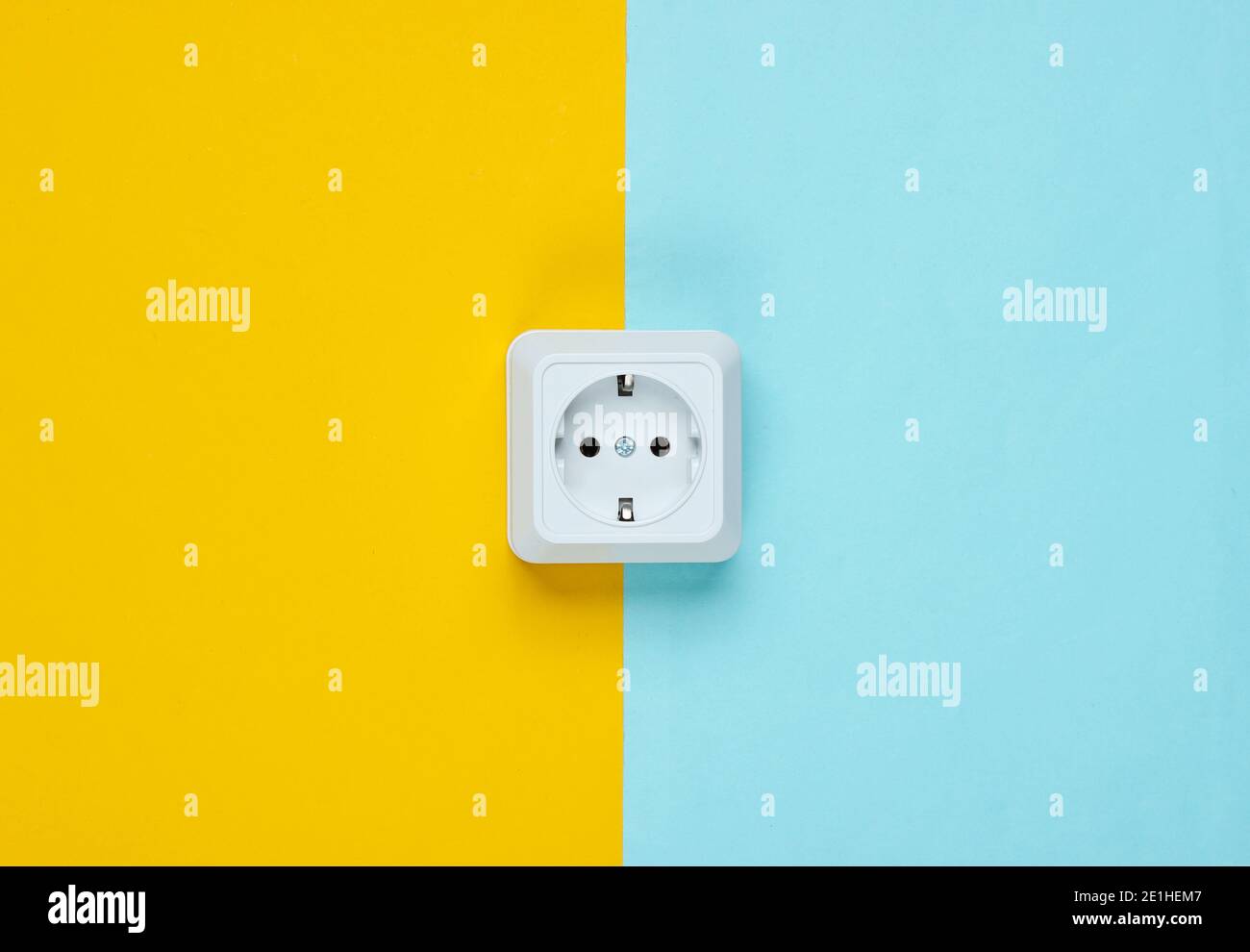 White plastic power socket on pastel background. Minimalism Stock Photo