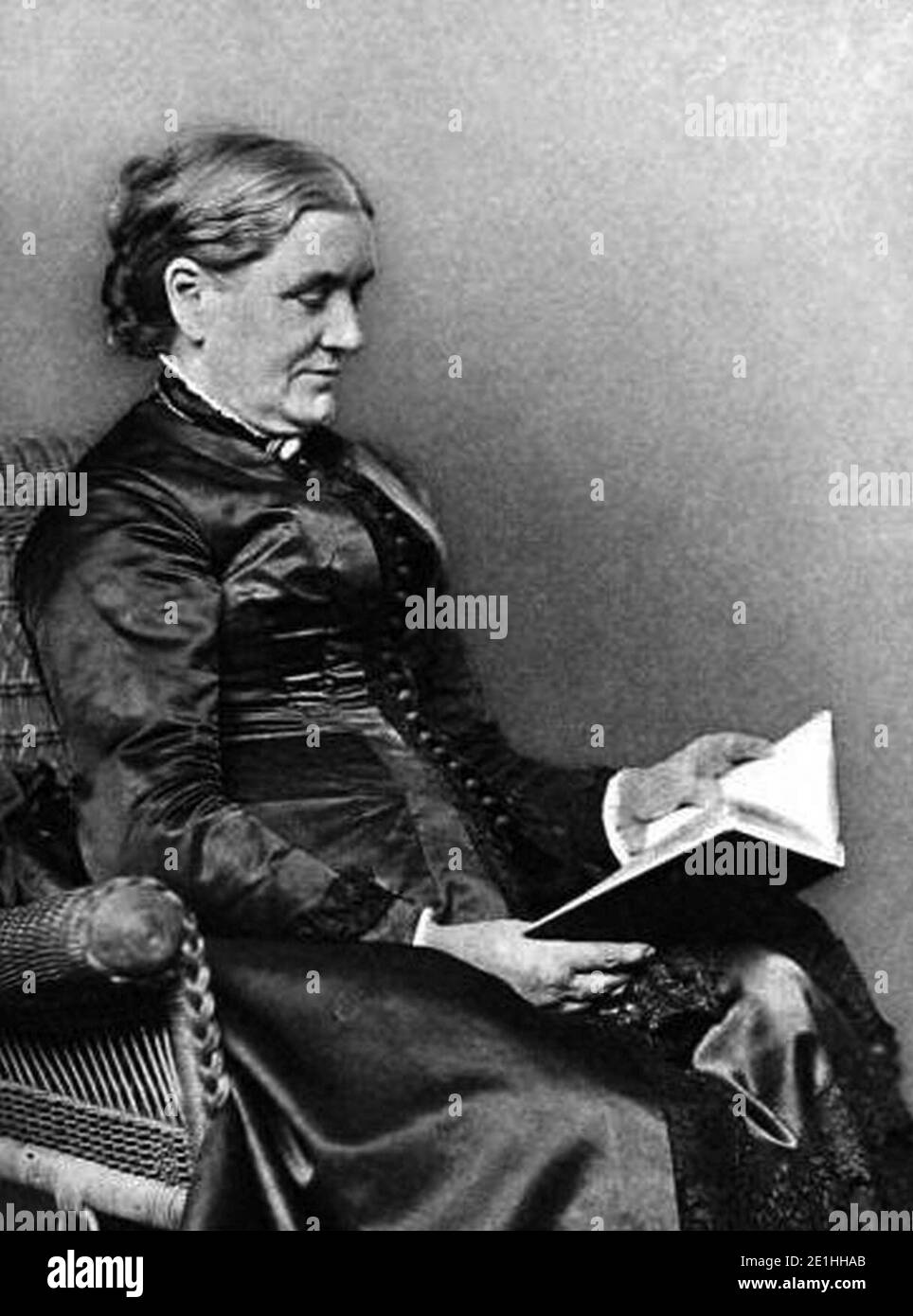 Lucy Larcom seated with book Stock Photo - Alamy