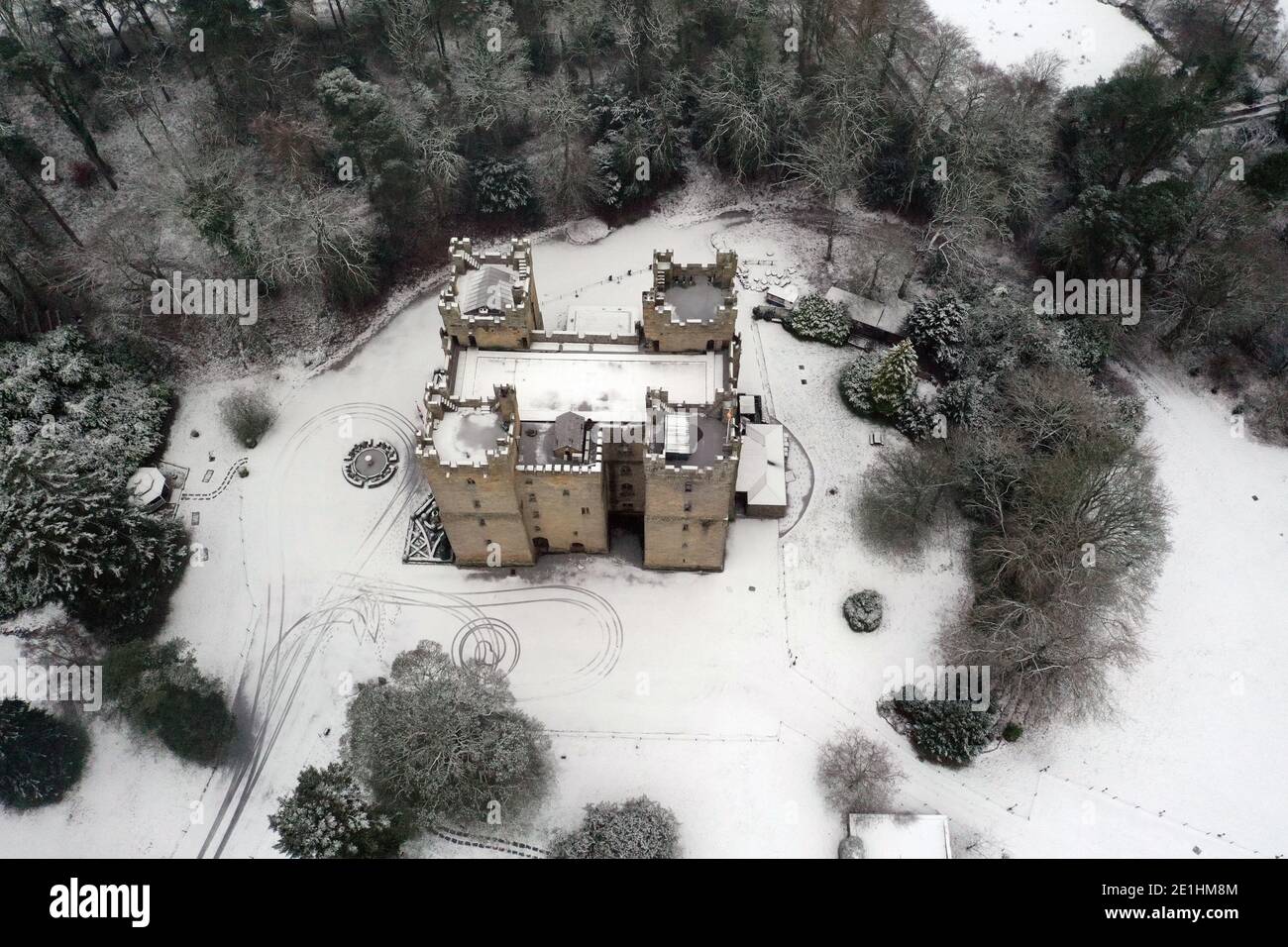 Snow covers the grounds surrounding Langley Castle Hotel near Haydon Bridge, Northumberland, a medieval tower house built in the 14th century. Stock Photo