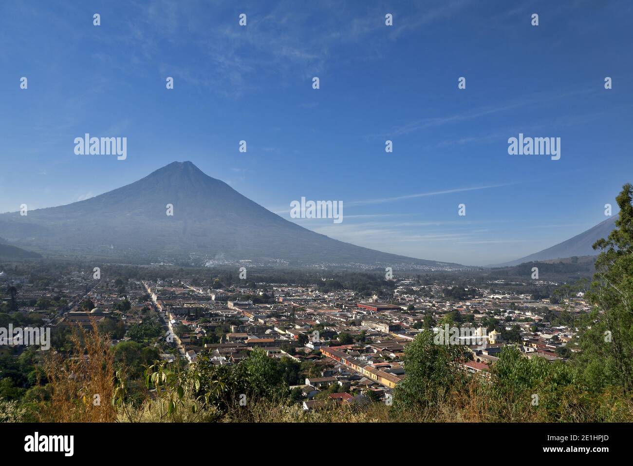 Antigua and volcano Agua, Guatemala, Central America. View from Cerro de la Cruz Stock Photo