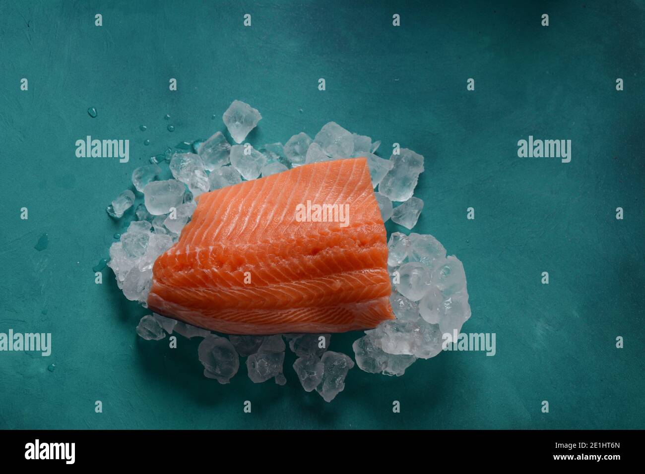 Raw salmon fillet on ice background Stock Photo - Alamy