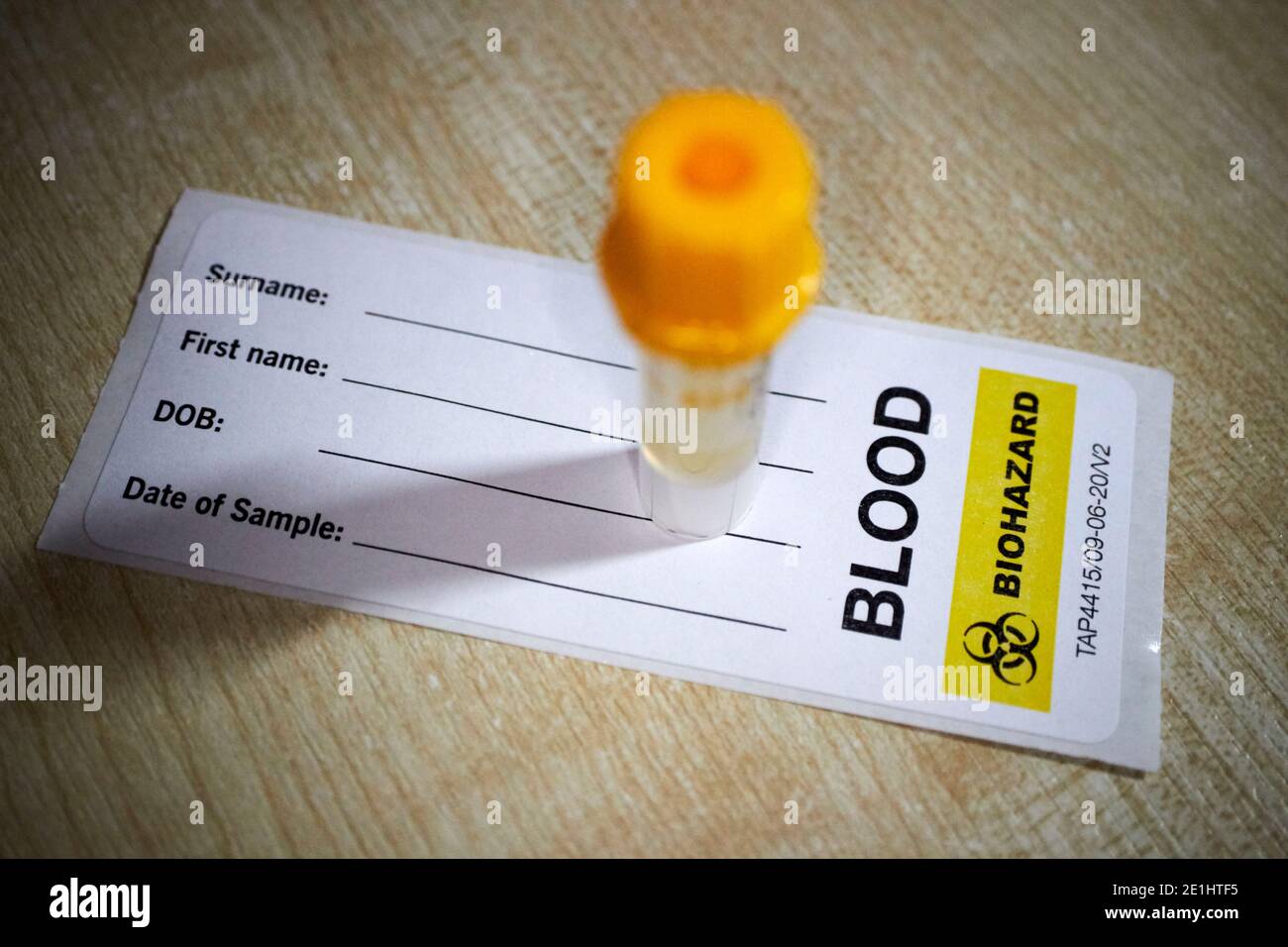 blood collection tube and label from commercial covid-19 antibody blood test kit for home testing for coronavirus antibodies received in the uk Stock Photo