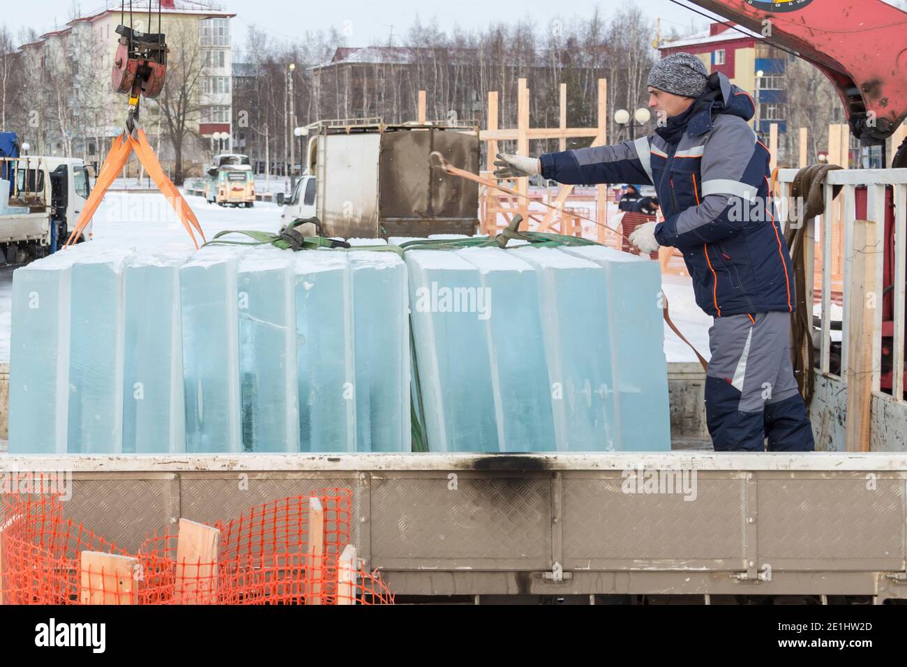 Portrait of a hydraulic crane operator loading ice panels Stock Photo