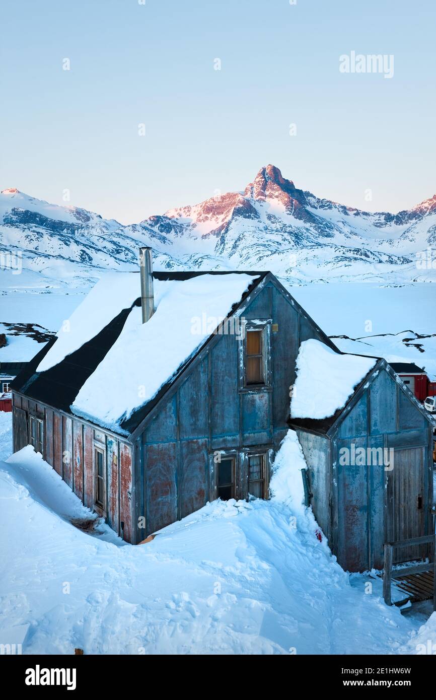 House in winter covered in snow, Tasiilaq, southeastern Greenland Stock Photo