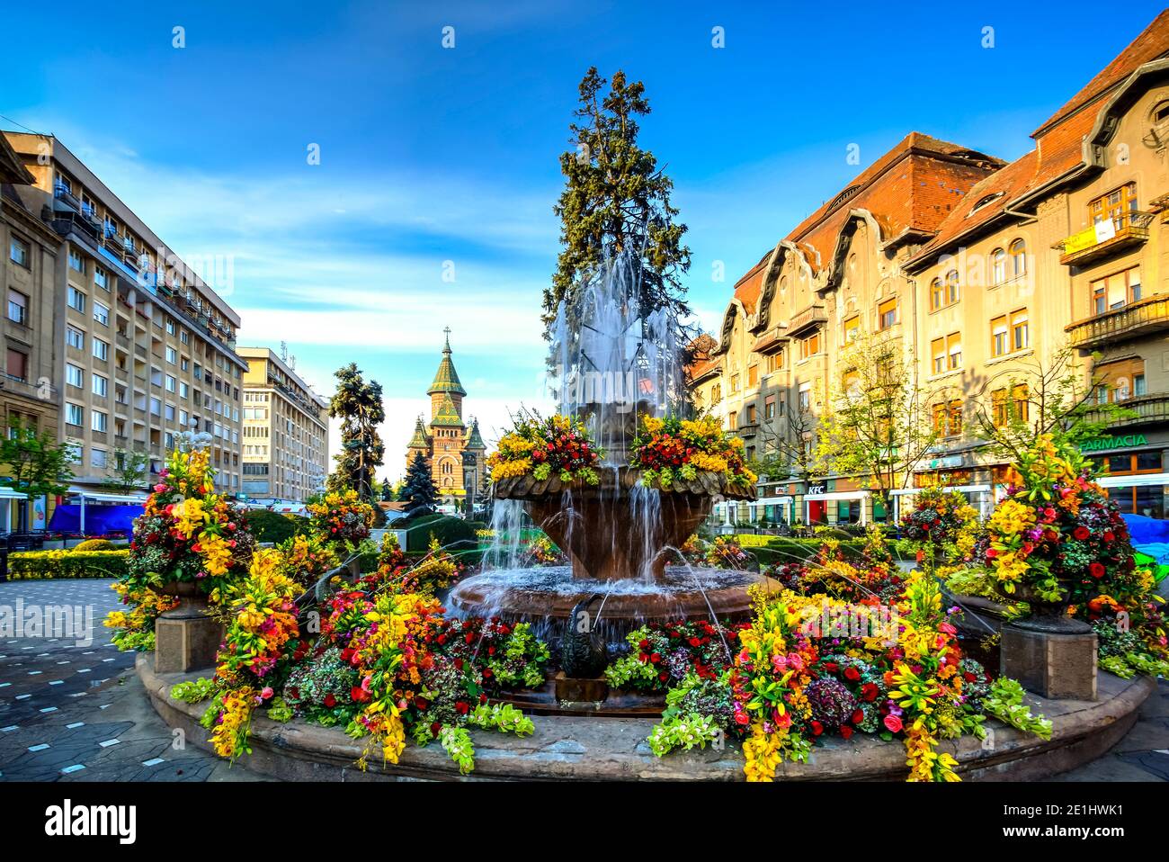 Victoria square and his main fountain decorated with flowers, Timisoara, Timis County, Romania. Photo taken on 21st of April 2019. Stock Photo