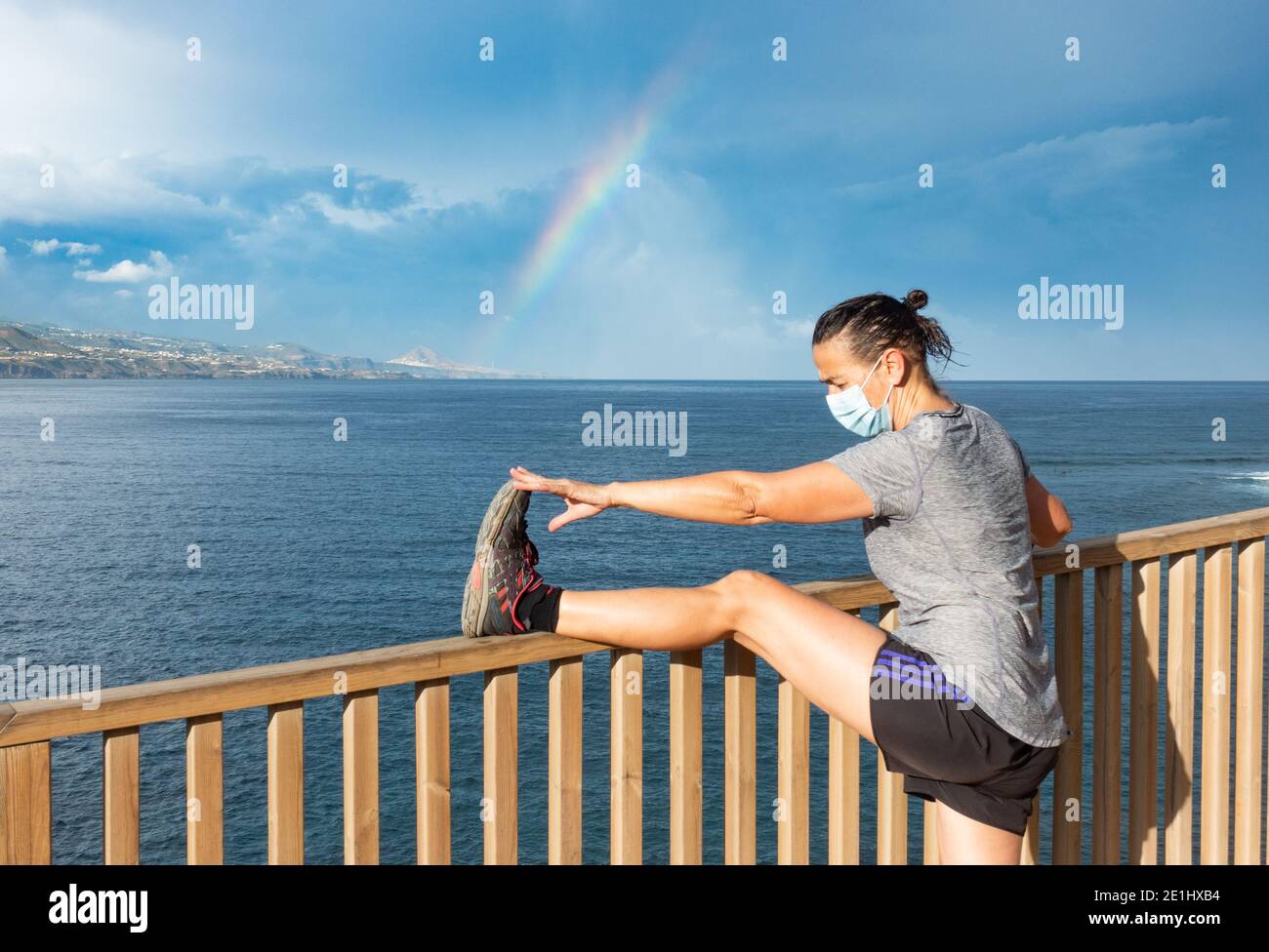 Las Palmas, Gran Canaria, Canary Islands, Spain. 7th January 2021. A jogger wearing a face mask