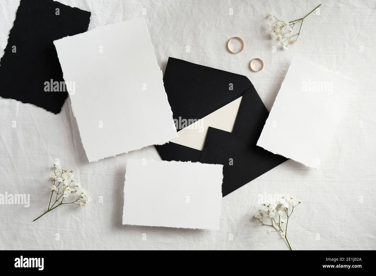 Wedding stationery mockup top view. Blank greeting cards, black