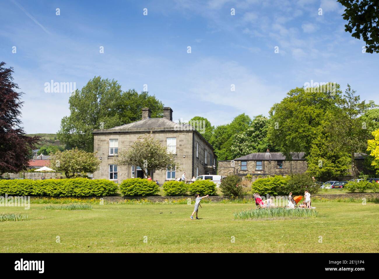 Families play in Whitaker park by the Whitaker museum and art gallery, Rawtenstall, Lancashire. Stock Photo