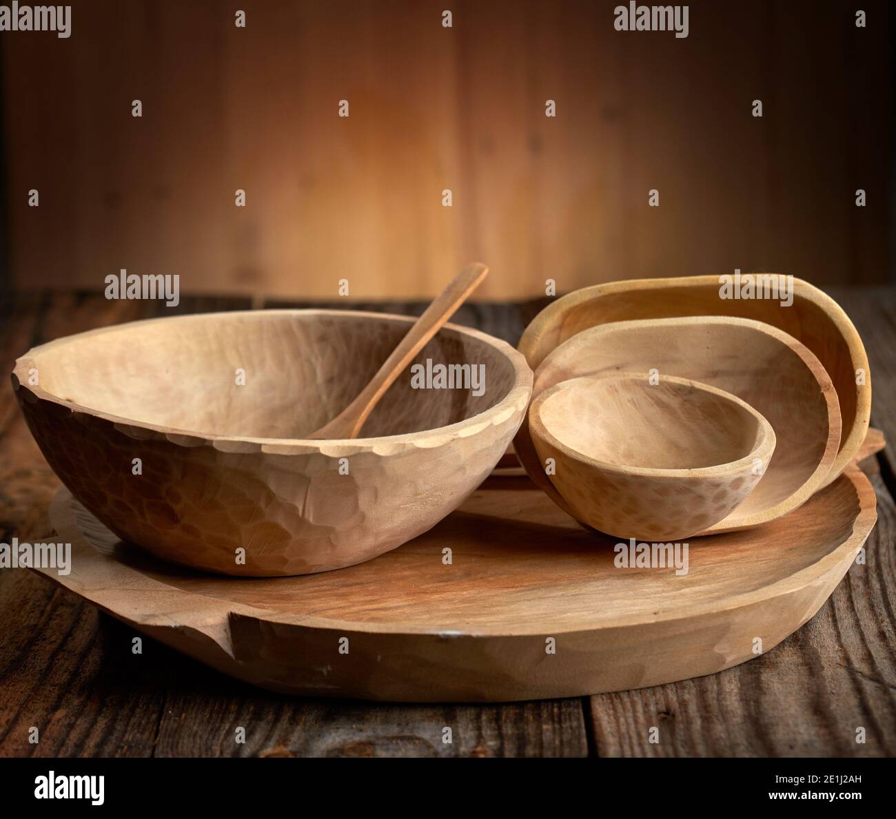 Carved wooden kitchen utensils, bowls and plate Stock Photo Alamy