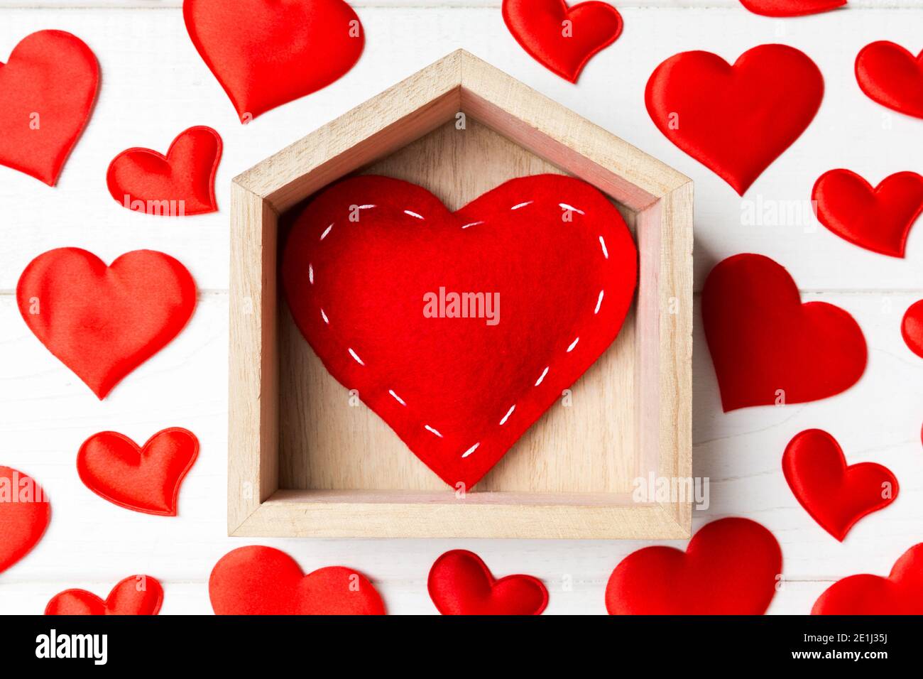 Close Up Of Red Heart In A House Decorated With Small Hearts On Wooden Background Valentine S Day Home Sweet Home Concept Stock Photo Alamy