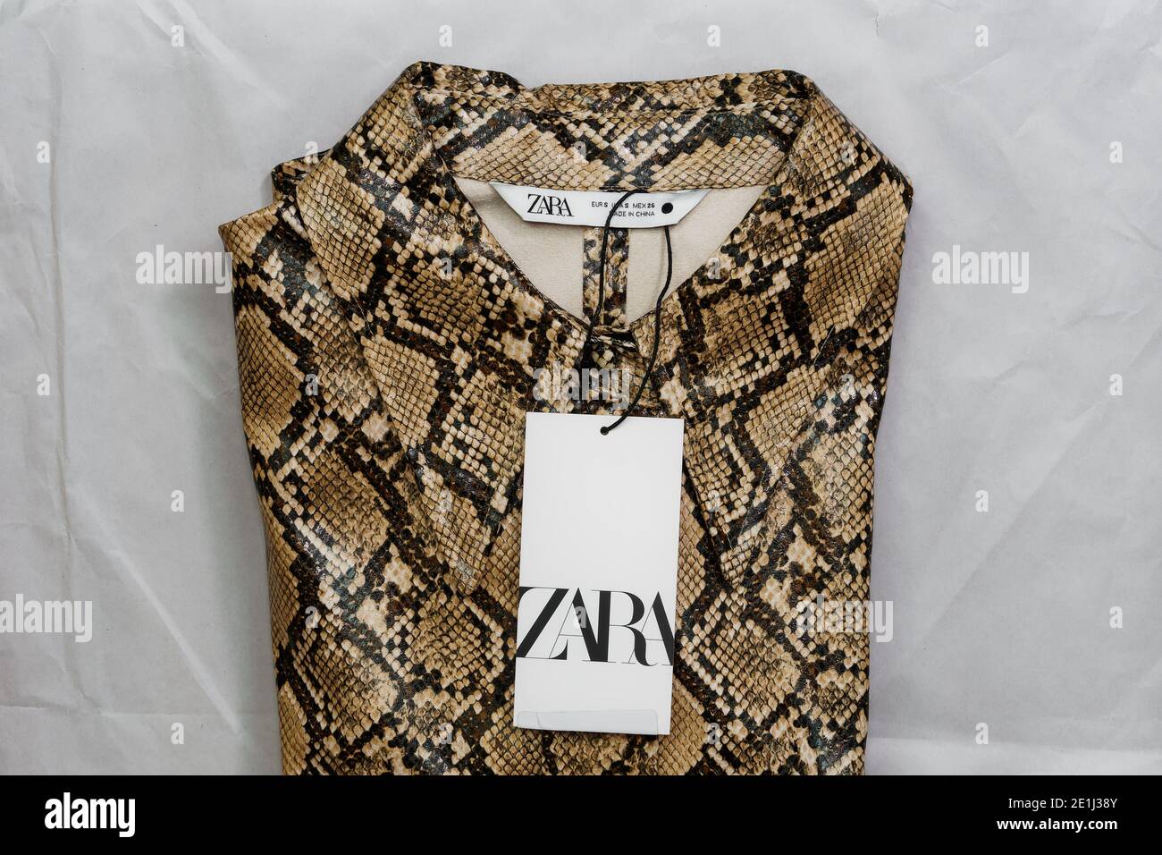 Zara Spanish clothes brand online delivery. Order package containing  Inditex retailer animal print female folded shirt with company logo Stock  Photo - Alamy