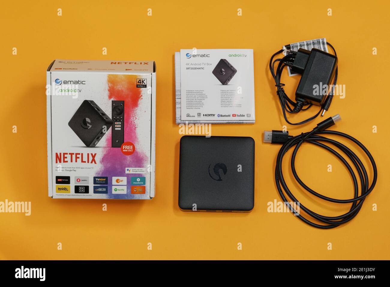 Android box top view display. Carton package containing an Ematic set-top media player streaming device including HDMI cable and wall plug Stock Photo Alamy