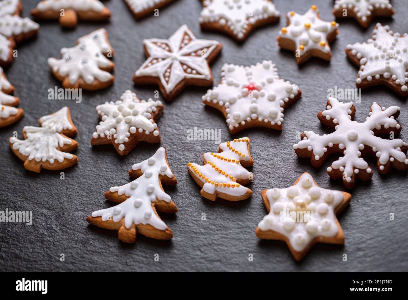 Homemade christmas cookies on slate table Stock Photo
